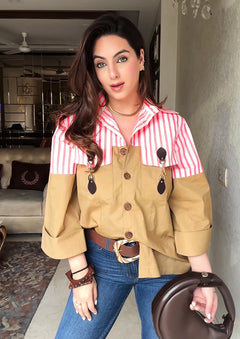 Woman wearing a red and white striped shirt Bold Stripe And Dual Tone Shirt
