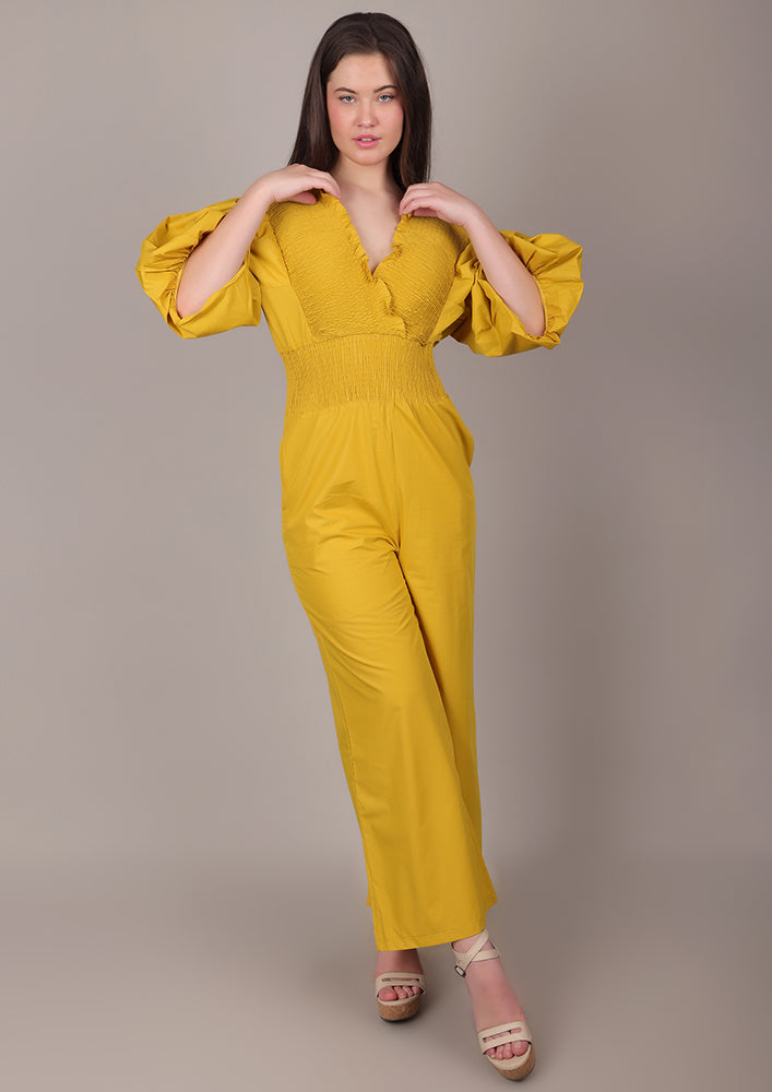 Yellow Smocked V-Neck Jumpsuit IKI CHIC Private Ltd.