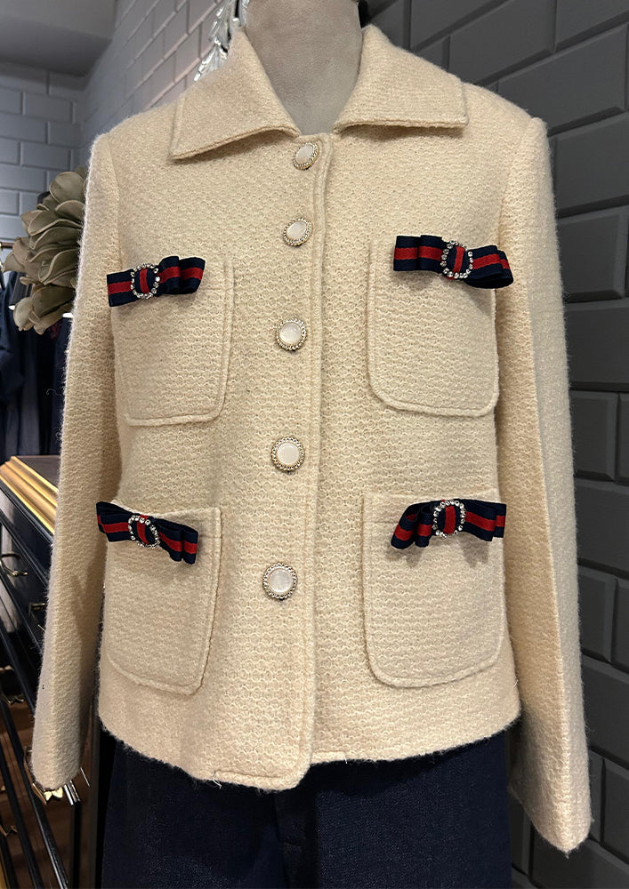 Off white woolen blazer with bow detailing