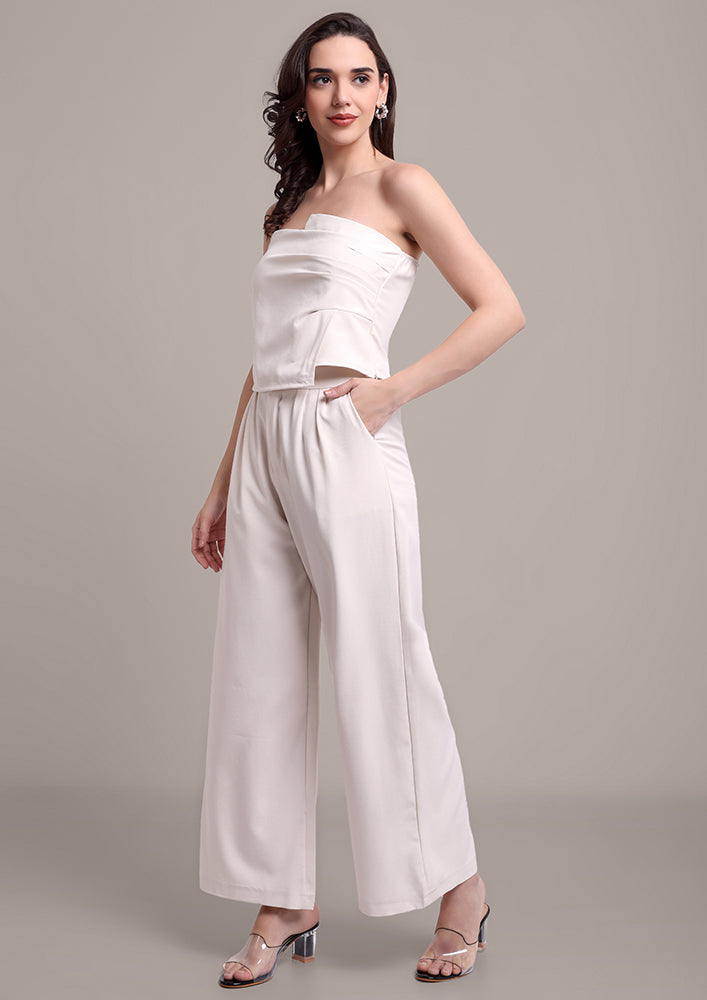 Off-White edgy tube top with wide leg pants set IKI CHIC Private Ltd.