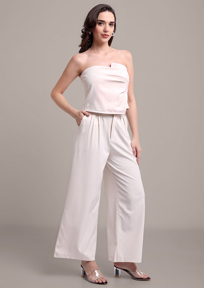 Off-White edgy tube top with wide leg pants set IKI CHIC Private Ltd.