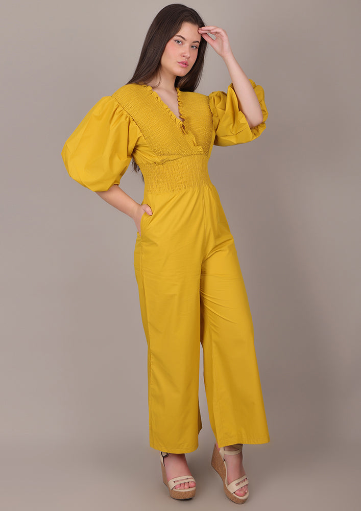 Yellow Smocked V-Neck Jumpsuit IKI CHIC Private Ltd.