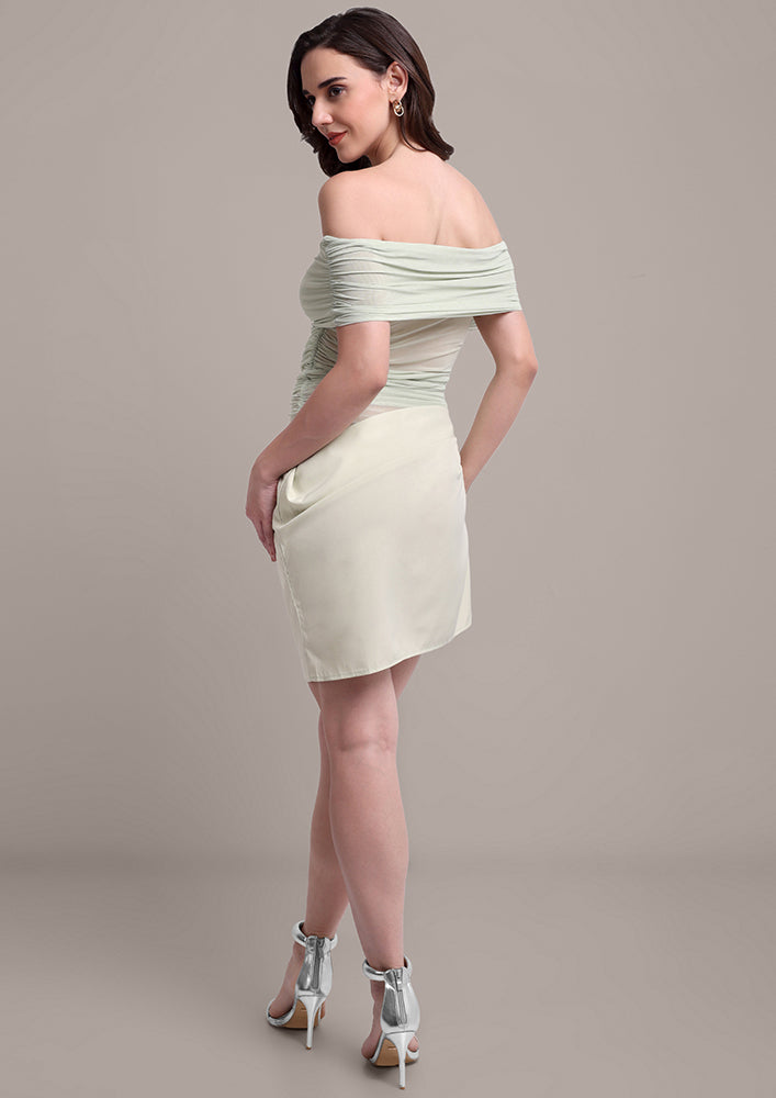Green ruched tube top and falling skirt dress IKI CHIC Private Ltd.