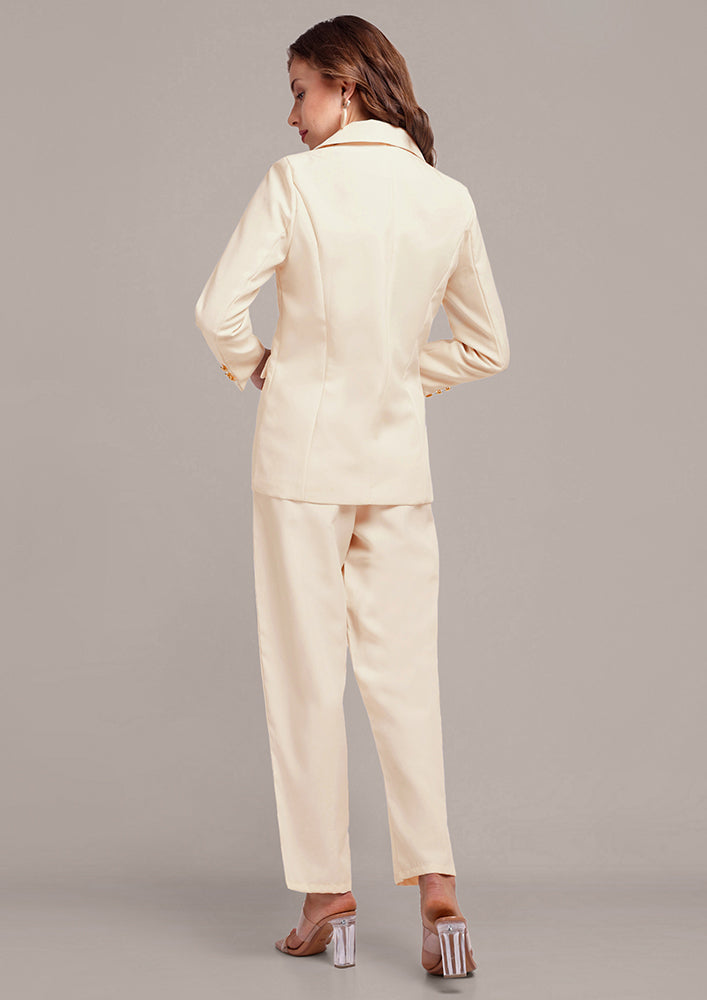 Oversized Off White blazer and pant set with golden buttons