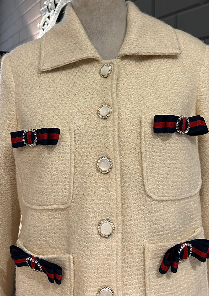 Off white woolen blazer with bow detailing