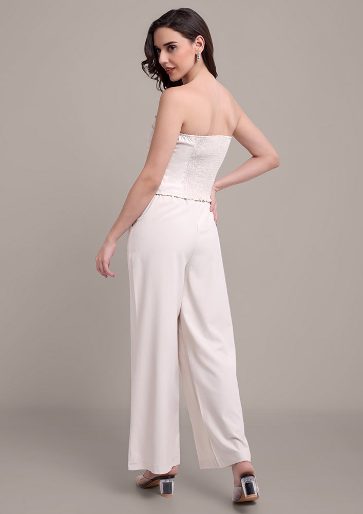 Off-White edgy tube top with wide leg pants set IKI CHIC Private Ltd.